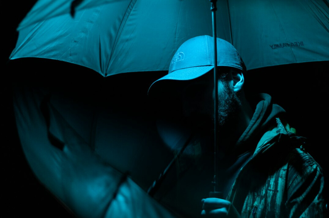 mysterious detective in rain